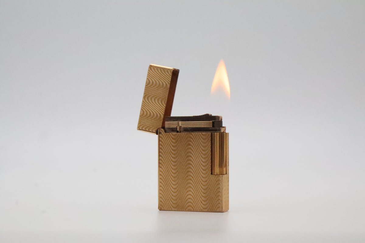 S.T. Dupont Ligne 2 Petit Modele small gold wavy pattern lighter with dual flame