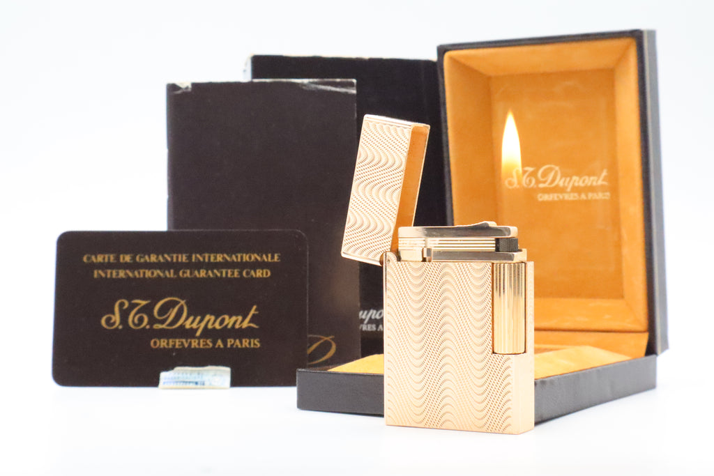 S.T. Dupont Ligne 2 Petit Modele small gold wavy pattern lighter, new old stock, with box and papers