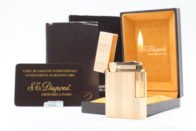 S.T. Dupont Ligne 2 Petit Modele small gold wavy pattern lighter, new old stock, with box and papers