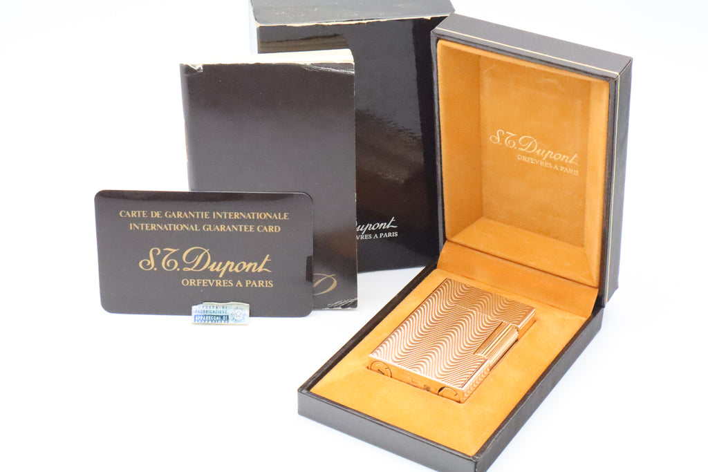 S.T. Dupont Ligne 2 Petit Modele small gold wavy pattern lighter, new old stock, with box and papers