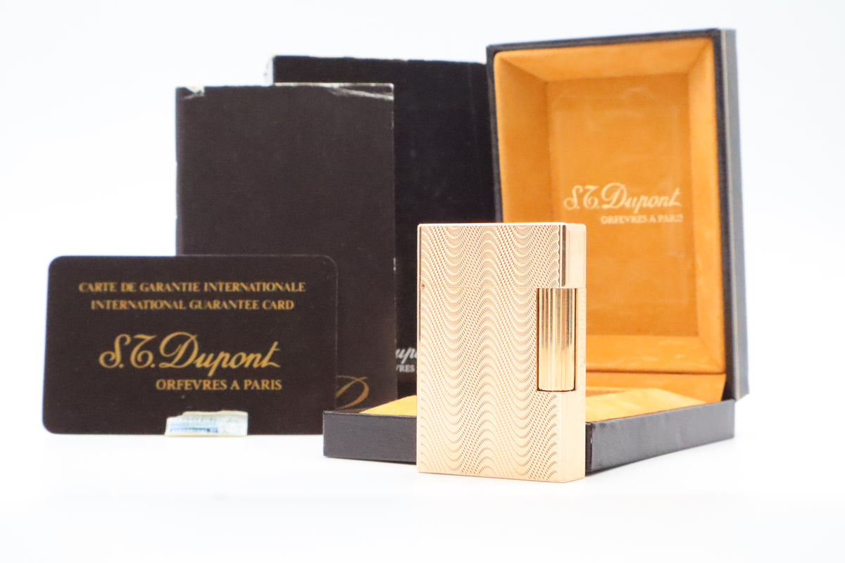 S.T. Dupont Ligne 2 Petit Modele small gold wavy pattern lighter, new old stock, with box and papers
