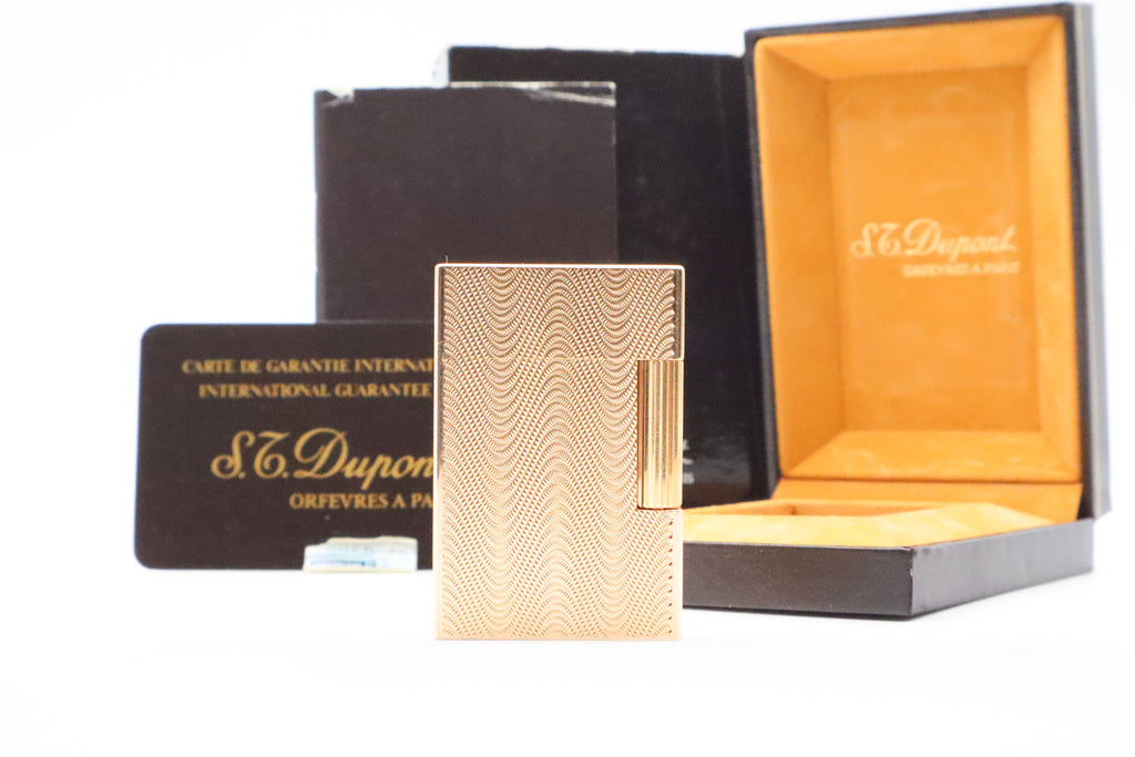 S.T. Dupont Ligne 2 Petit Modele small gold wavy pattern lighter, new old stock, with box and papers