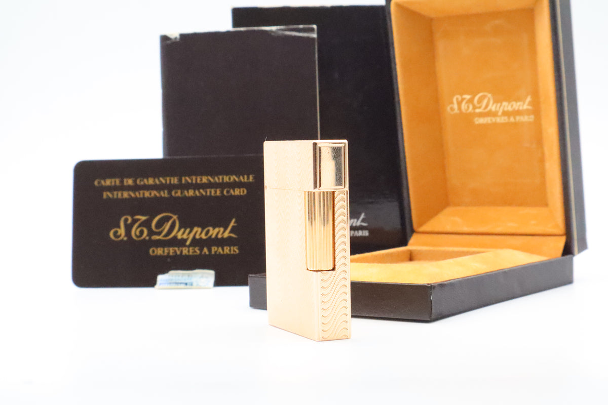 S.T. Dupont Ligne 2 Petit Modele small gold wavy pattern lighter, new old stock, with box and papers