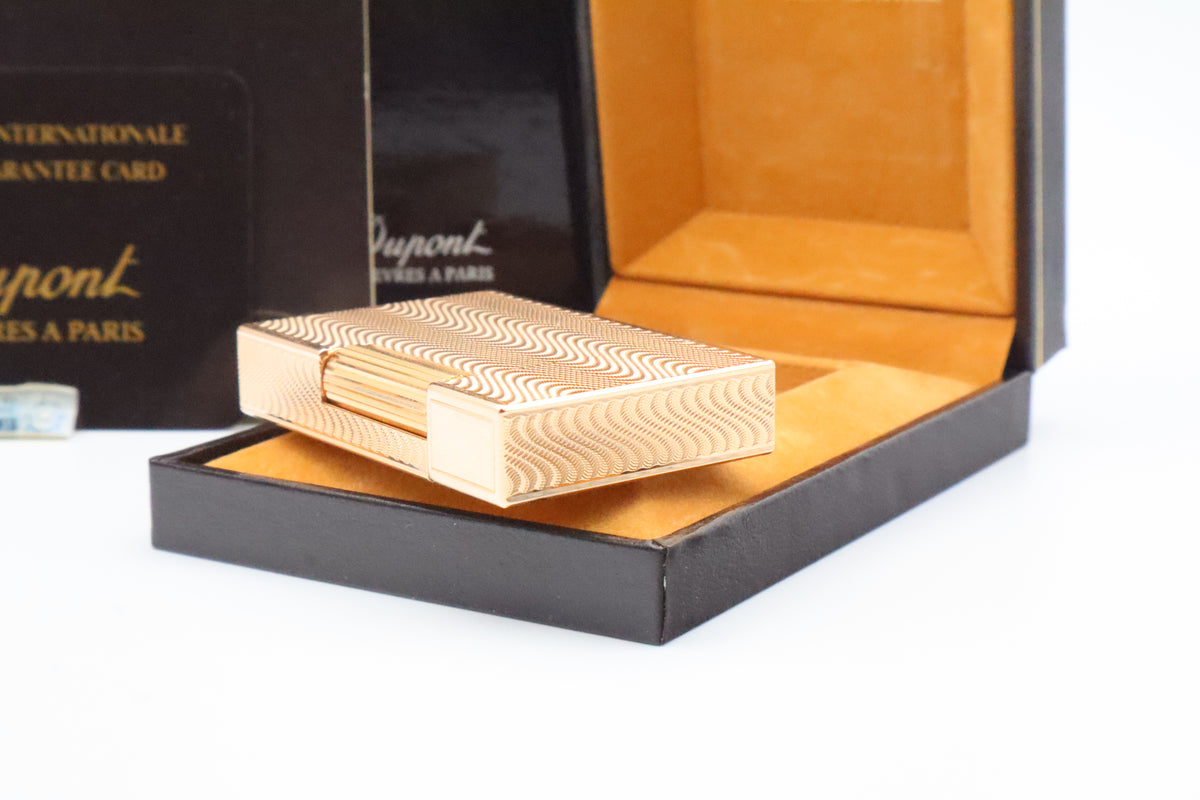 S.T. Dupont Ligne 2 Petit Modele small gold wavy pattern lighter, new old stock, with box and papers