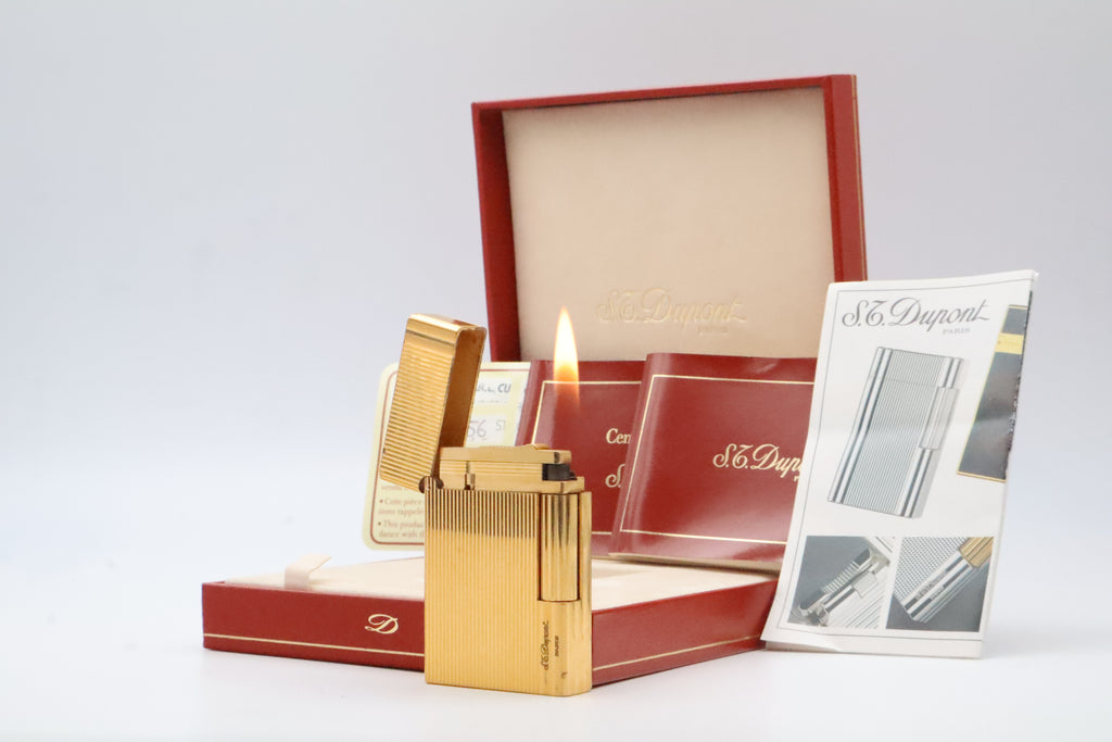 S.T. Dupont Gatsby gold vertical stripes lighter, reference 18237, with original box, papers and guarantee card