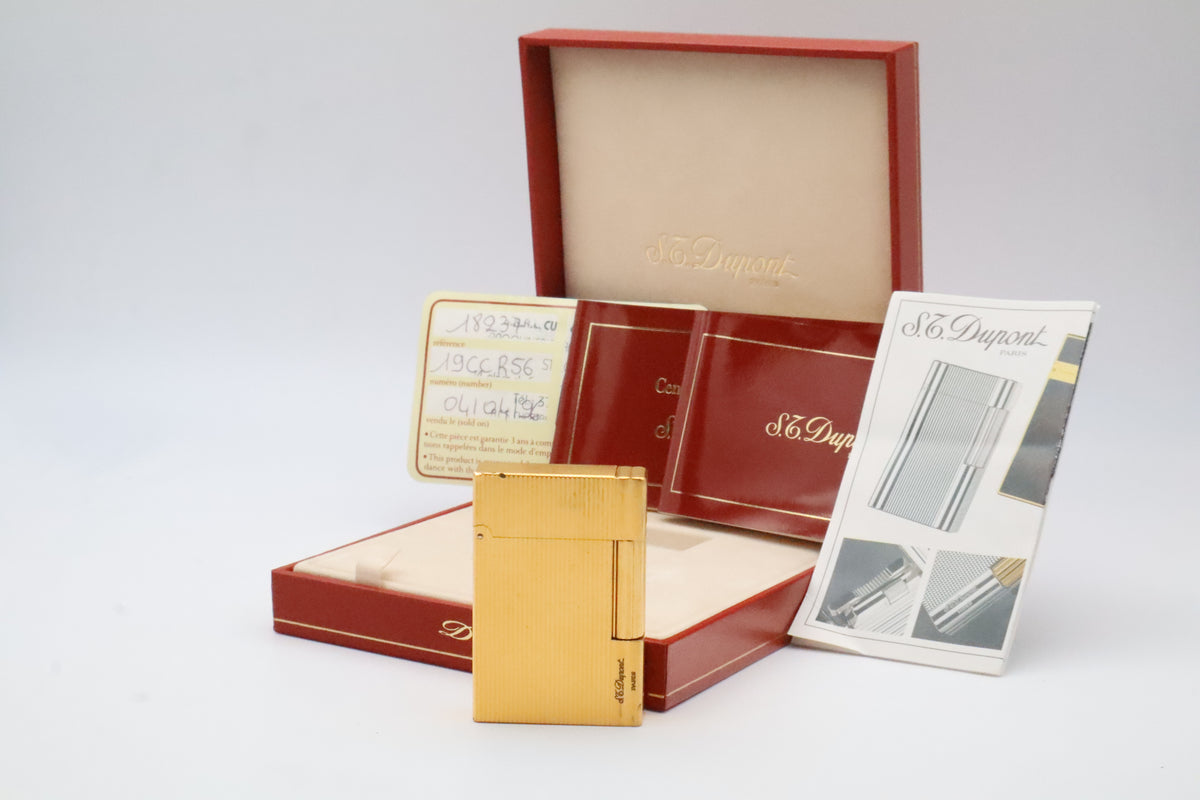 S.T. Dupont Gatsby gold vertical stripes lighter, reference 18237, with original box, papers and guarantee card