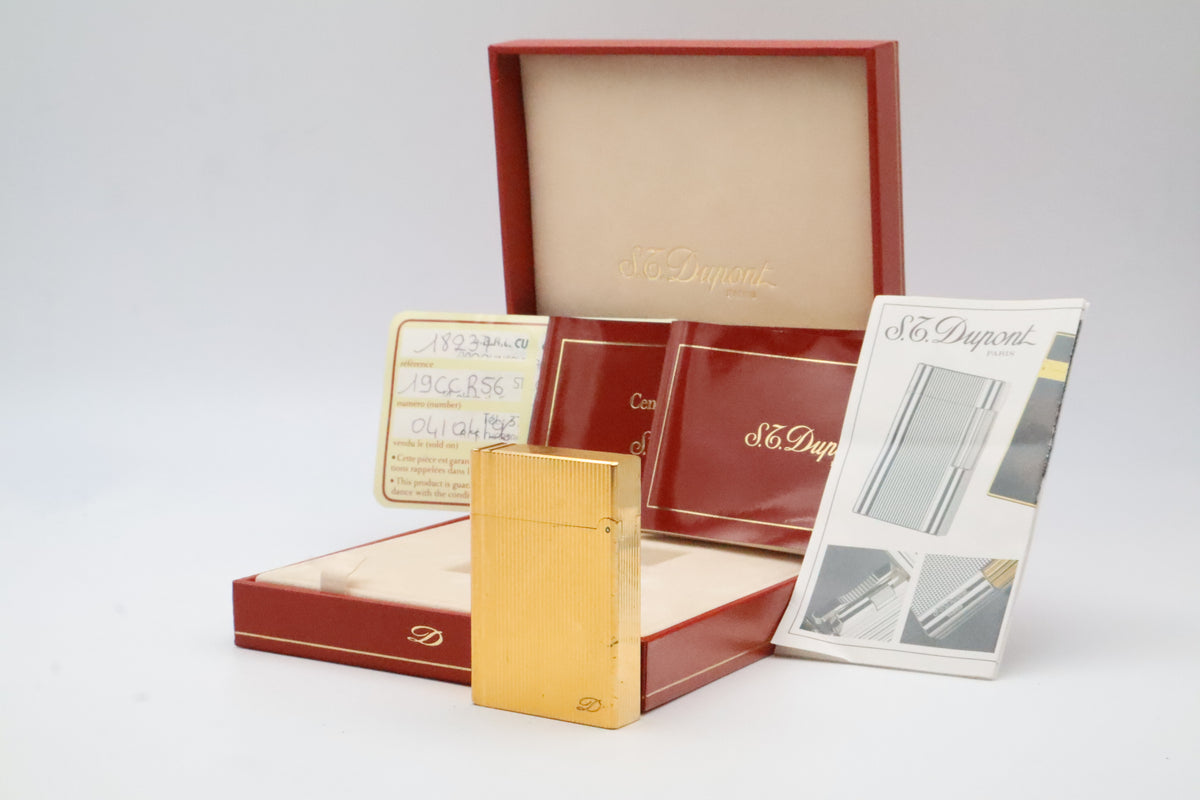 S.T. Dupont Gatsby gold vertical stripes lighter, reference 18237, with original box, papers and guarantee card