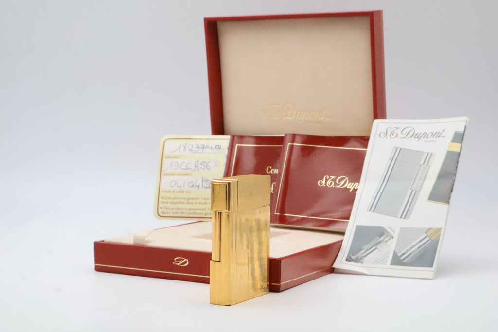 S.T. Dupont Gatsby gold vertical stripes lighter, reference 18237, with original box, papers and guarantee card
