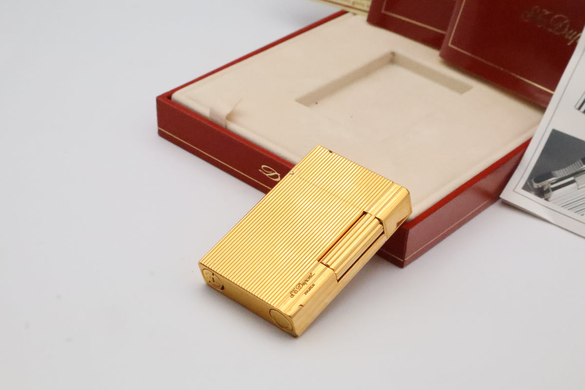 S.T. Dupont Gatsby gold vertical stripes lighter, reference 18237, with original box, papers and guarantee card