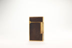 Prototype S.T. Dupont Ligne 2 Grand Modele lighter in gold plate with real wood inlay panels, marked MODELE on the base