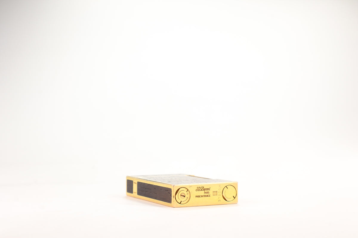 Prototype S.T. Dupont Ligne 2 Grand Modele lighter in gold plate with real wood inlay panels, marked MODELE on the base