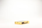Prototype S.T. Dupont Ligne 2 Grand Modele lighter in gold plate with real wood inlay panels, marked MODELE on the base