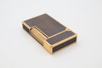 Prototype S.T. Dupont Ligne 2 Grand Modele lighter in gold plate with real wood inlay panels, marked MODELE on the base