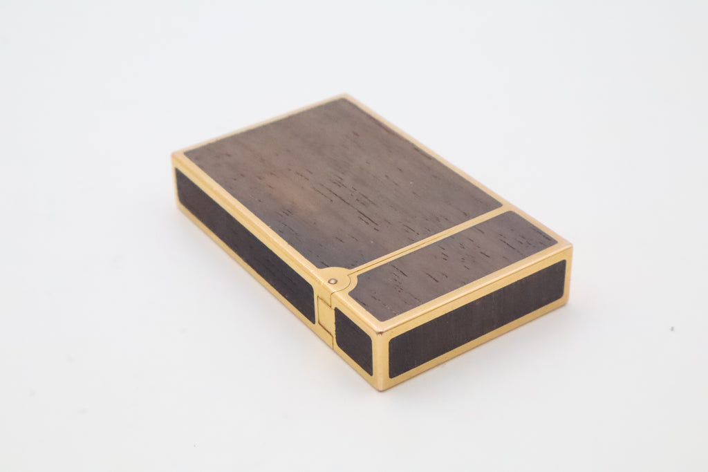 S.T. Dupont Ligne 2 gold plated lighter with dark wood inlay panels, marked MODELE on the base