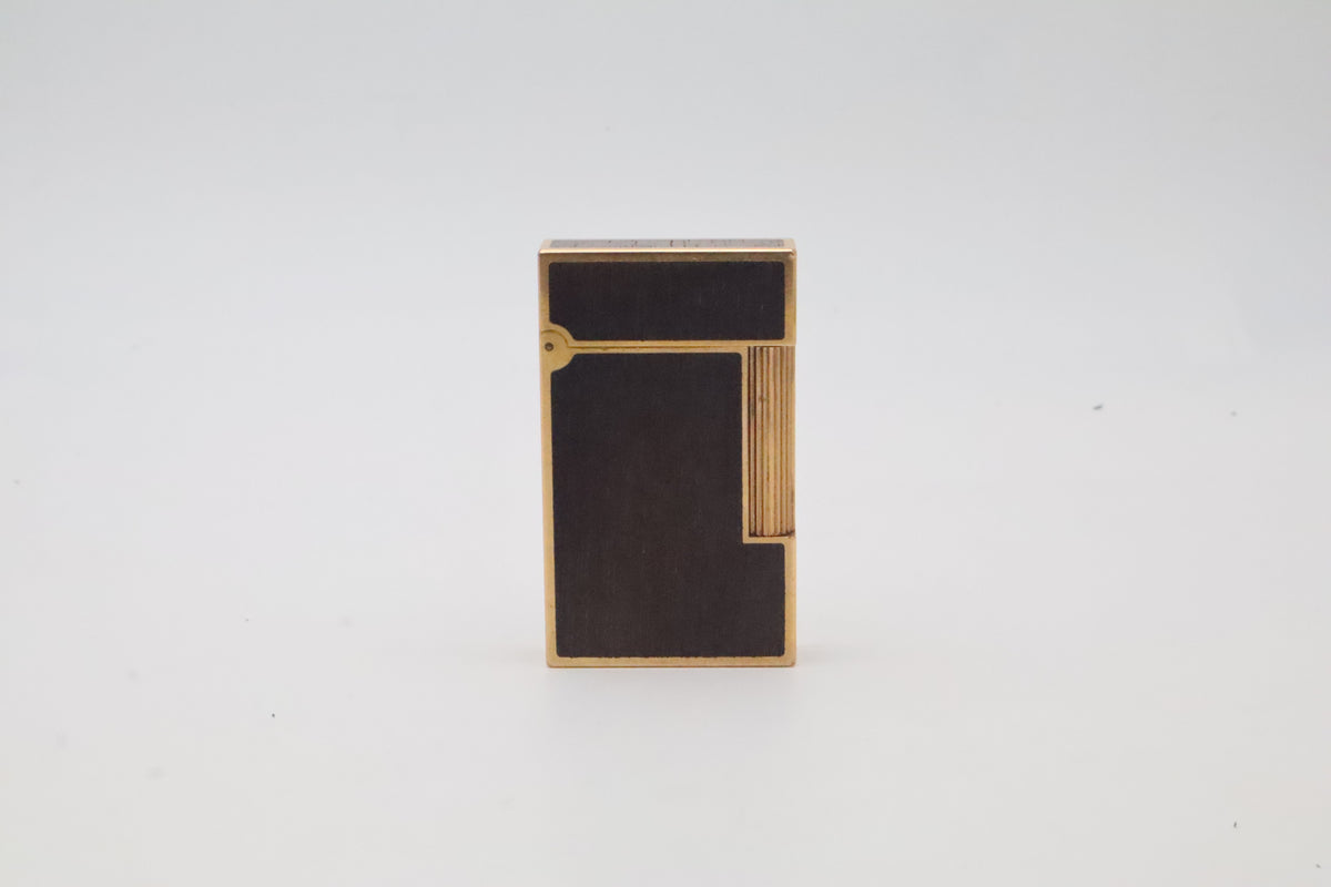 S.T. Dupont Ligne 2 gold plated lighter with dark wood inlay panels, marked MODELE on the base