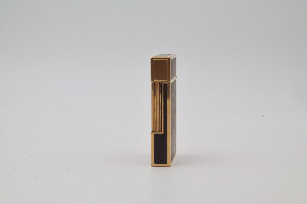 S.T. Dupont Ligne 2 gold plated lighter with dark wood inlay panels, marked MODELE on the base
