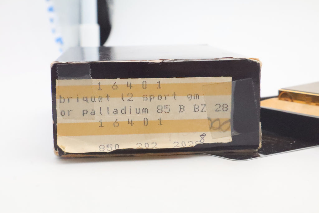 Original S.T. Dupont box label reading 16401, briquet l2 sport gm, or palladium, 85 B BZ 28