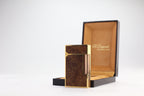 S.T. Dupont Ligne 2 Grand Modele lighter with figured burl wood panels and gold plated trim, with its original box