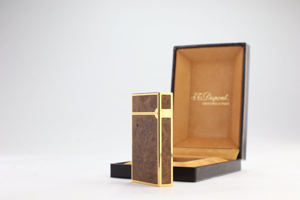 S.T. Dupont Ligne 2 Grand Modele lighter with figured burl wood panels and gold plated trim, with its original box