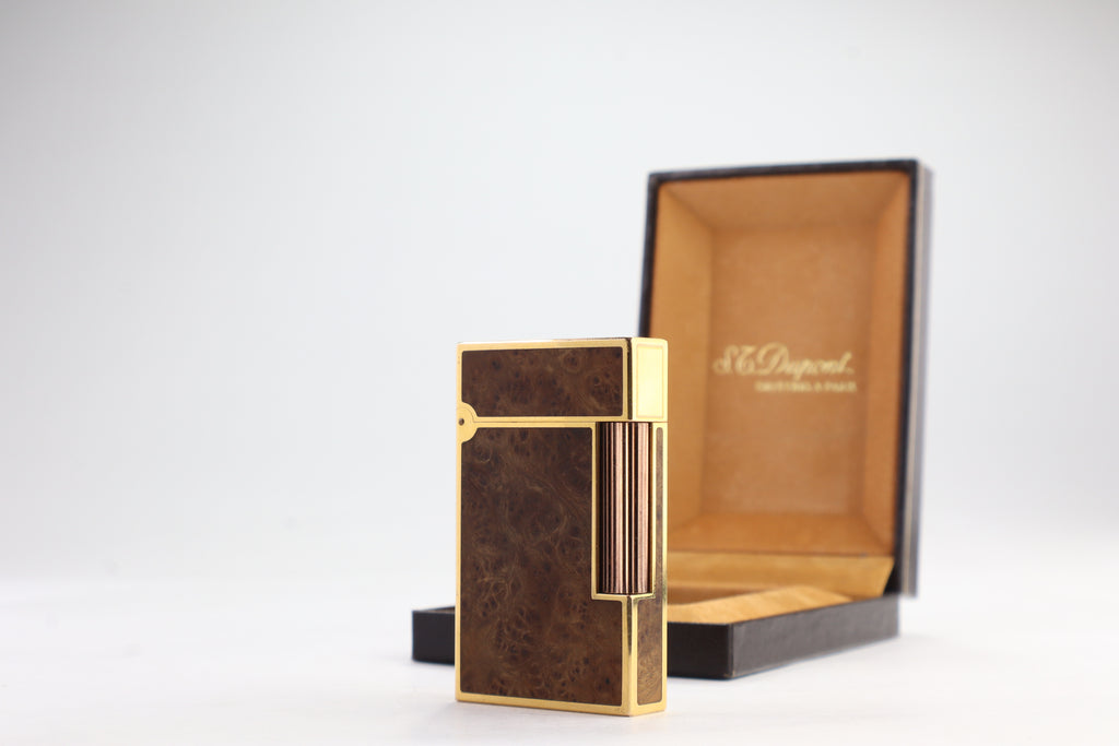 S.T. Dupont Ligne 2 Grand Modele lighter with figured burl wood panels and gold plated trim, with its original box