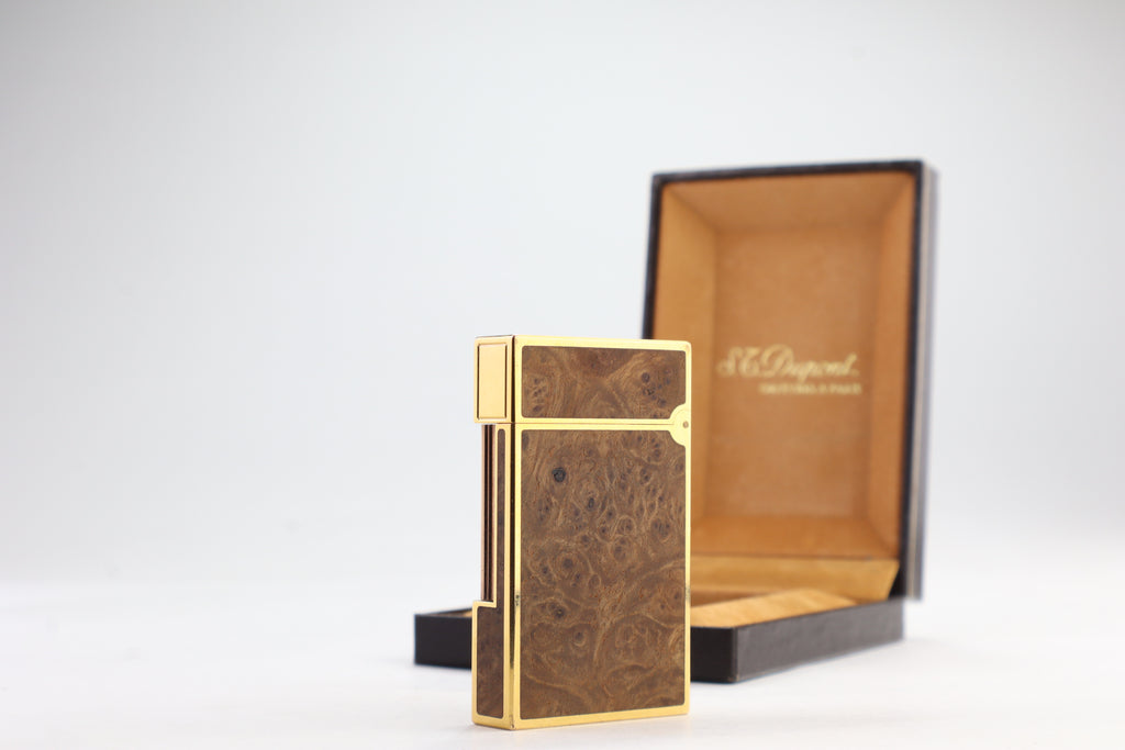 S.T. Dupont Ligne 2 Grand Modele lighter with figured burl wood panels and gold plated trim, with its original box