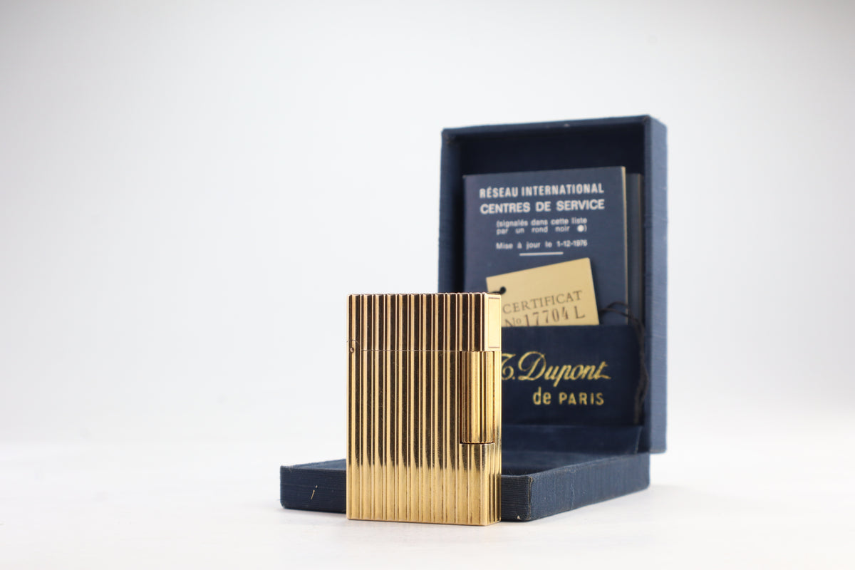 S.T. Dupont Ligne 2 pipe lighter in gold with vertical striping, with its navy box and numbered certificate