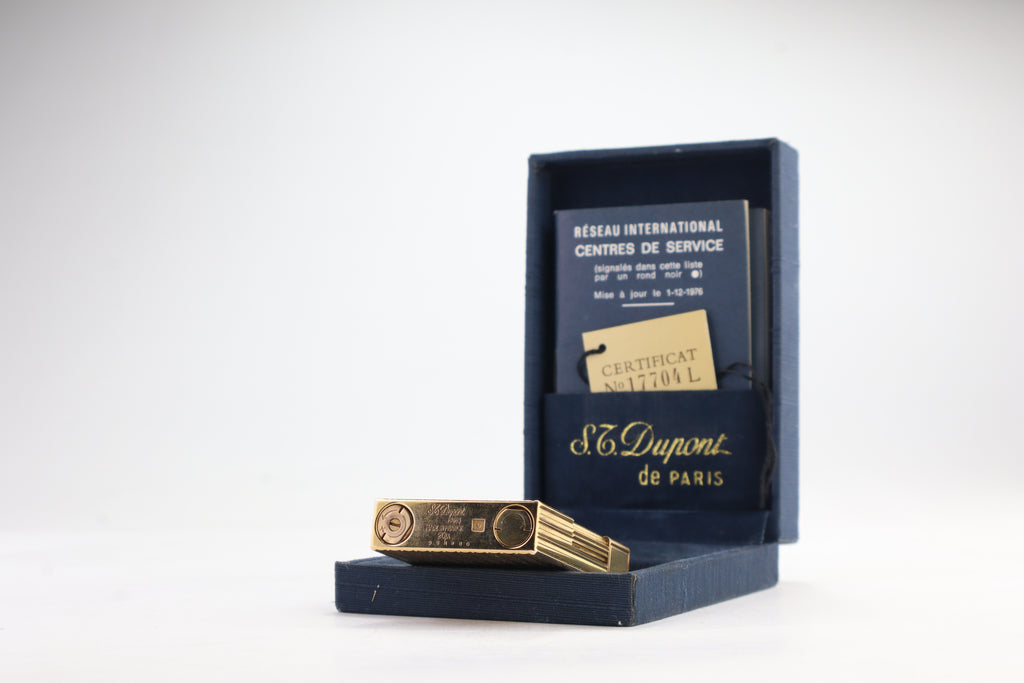 Base of the S.T. Dupont Ligne 2 pipe lighter, engraved S.T. Dupont Paris Made in France