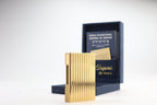 S.T. Dupont Ligne 2 pipe lighter in gold with vertical striping, with its navy box and numbered certificate