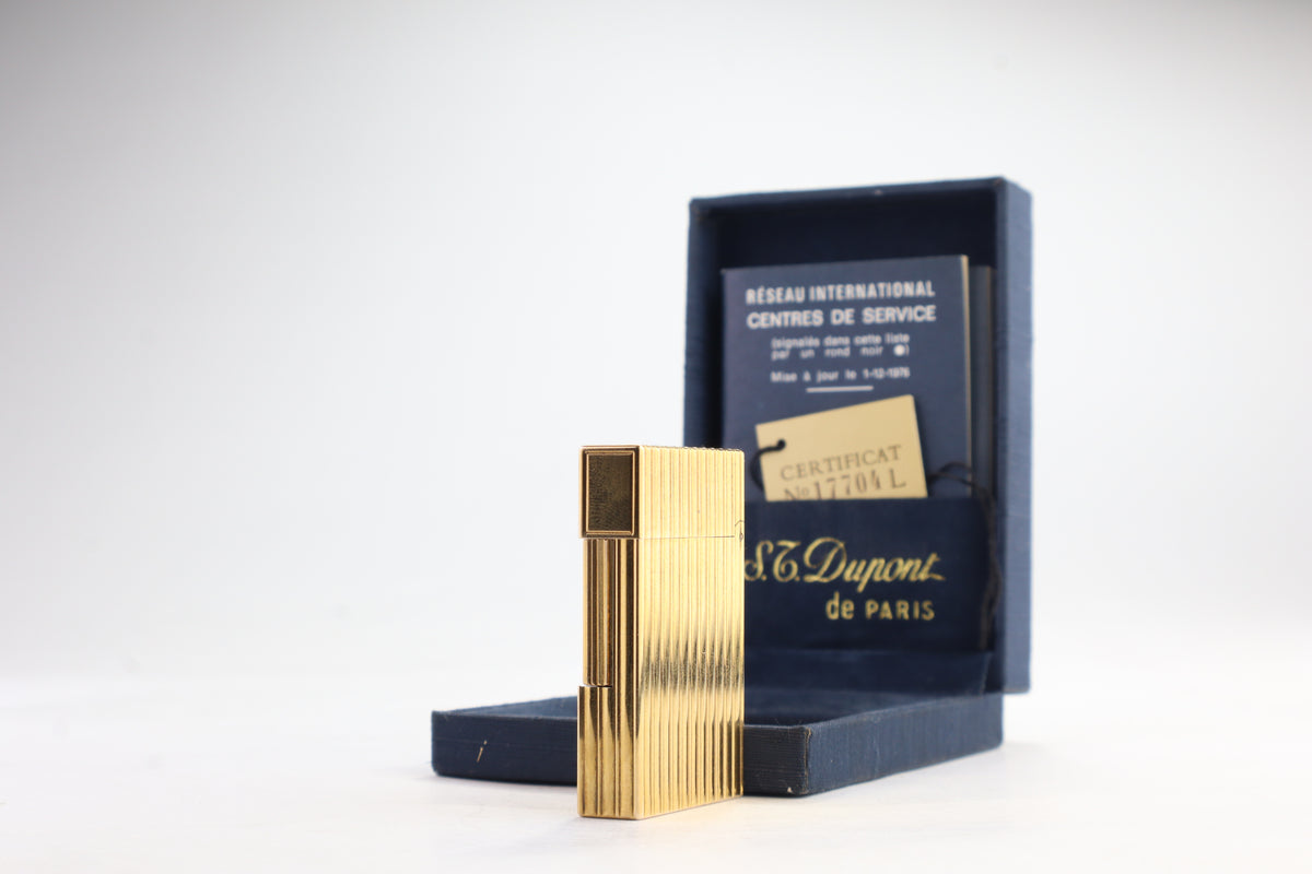 S.T. Dupont Ligne 2 pipe lighter in gold with vertical striping, with its navy box and numbered certificate