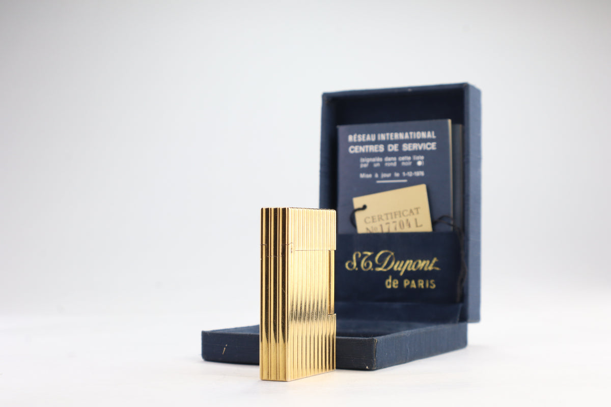 S.T. Dupont Ligne 2 pipe lighter in gold with vertical striping, with its navy box and numbered certificate