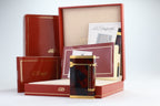 S.T. Dupont Ligne D lighter in marbled Normandie laque de chine with gold trim, with its red box, papers and numbered lacquer certificate
