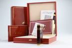 S.T. Dupont Ligne D lighter in marbled Normandie laque de chine with gold trim, with its red box, papers and numbered lacquer certificate