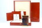 S.T. Dupont Ligne D lighter in marbled Normandie laque de chine with gold trim, with its red box, papers and numbered lacquer certificate