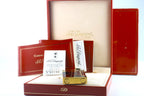 Base of the S.T. Dupont Ligne D lighter engraved S.T. Dupont Paris Made in France, with the numbered laque de Chine certificate behind it